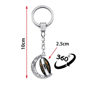 Glow-in-the-dark 12 zodiac keychain with 360-degree rotating moon pendant and galaxy gem