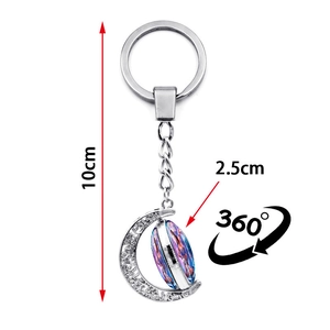 Luminous constellation crescent moon keychain with rotating 360 degree glass pendant