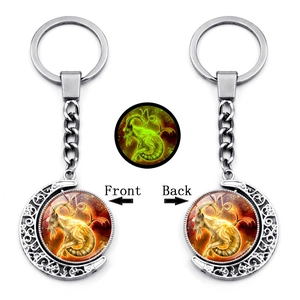Luminous Capricorn constellation moon keychain with silver rotating pendant and glass dome