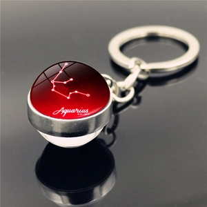 Aquarius zodiac sign keychain with a red crystal ball pendant on silver metal chain