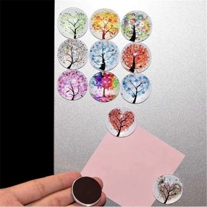 Detailed view of 12 glass tree of life fridge magnets with strong circular magnetic back