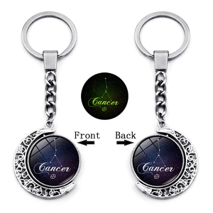 Luminous Cancer constellation keychain with rotating moon pendant and double-sided glass gem