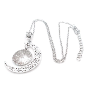 Vintage silver moon pendant necklace featuring compass glass gem and hollow crescent moon