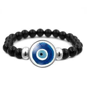 Pulsera de ojo turco azul con cuentas negras pulidas y separadores plateados