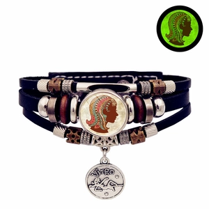 Vue détaillée du bracelet Virgo en cuir multicouche avec dôme en verre lumineux et métal