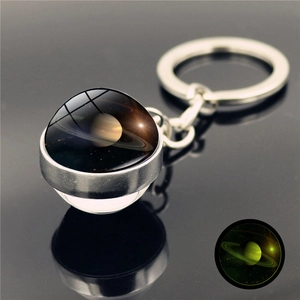 Luminous Saturn solar system keychain with double-sided glass ball and metal ring