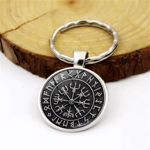 Vintage Viking Vegvisir compass keychain with Nordic runes on natural wooden block