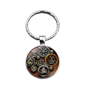 Detailed view of Viking Vegvisir compass and gear symbols on a retro metal keychain