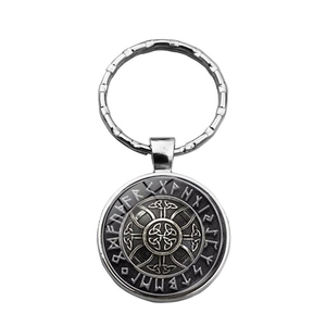 Detailed view of silver Viking keychain featuring Elder Futhark runes and Celtic knot design