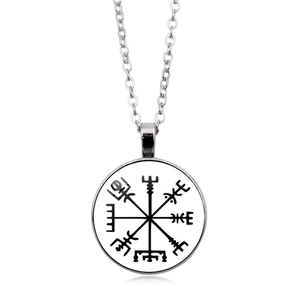 Detail of Viking Vegvisir compass pendant necklace with white base and black totem