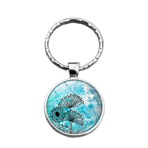 Porte-clés rond en verre avec motif floral et pissenlit bleu-vert artistique