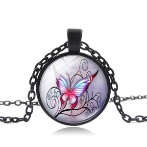 Detailed close-up of a vintage glass dome pendant with purple butterfly artwork and black chain