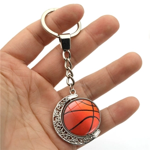 Rotating basketball moon keychain with double-sided glass gem and hollow crescent charm