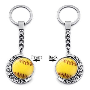 Detailed front and back views of a double-sided rotating softball crescent moon keychain