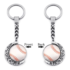 Rotating baseball moon keychain detail showing both front and back silver alloy views