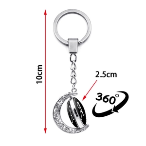 Rotating alphabet A pendant keychain in silver moon shape with polished finish 10cm