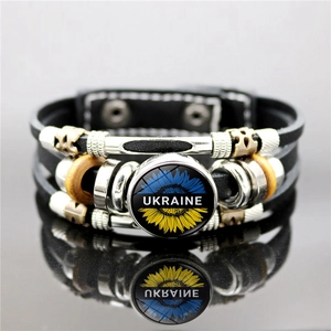 Detail of multi-layer leather bracelet featuring Ukraine flag sunflower gemstone