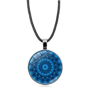 Detail view of Mandala Flower of Life pendant with blue glass gem and black wax rope cord