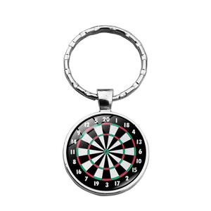 Macro shot of glass domed dartboard keychain with numeric 1-20 detail and silver metal ring