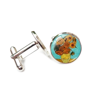 Macro view of silver cufflinks with Van Gogh Sunflower art under glass cabochon