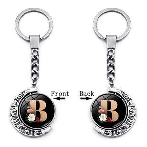 Rotating 360-degree moon pendant keychain with double-sided letter B and floral design