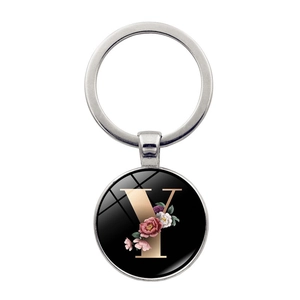 Silver metal keychain with glass cabochon featuring alphabet Y and floral design