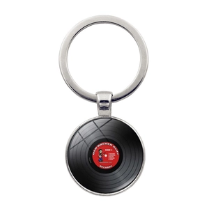 Detailed view of vinyl record keychain with old rocker design on a silver metal ring