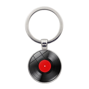 Vintage vinyl record keychain with red label and silver metal ring on white background