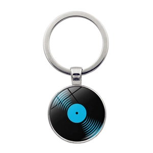 Detailed close-up of retro vinyl record keychain with glass dome and silver metal ring