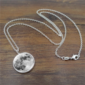Luminous moon pendant necklace with glowing star galaxy dome on silver chain for women