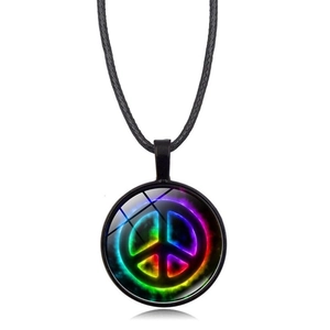 Macro detail of rainbow peace sign glass pendant on a black braided cord necklace