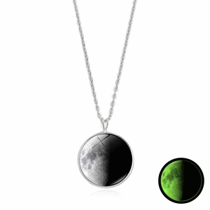Luminous moon pendant necklace showing glowing effect in dark with silver chain