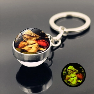Luminous keychain featuring a silver glass dome pendant with classic Virgin and Child art