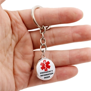 Porte-clés d'alerte médicale argenté avec compartiment pour infos d'urgence