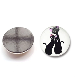 Front and back detail of 30mm glass fridge magnet featuring cute black cat illustrations