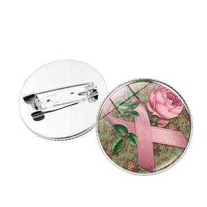 Broche ruban rose contre le cancer du sein avec dôme en verre et motif floral rétro