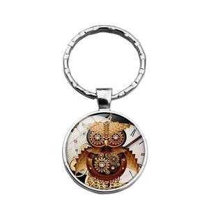 Steampunk owl keychain with vintage clock gears and mechanical parts design