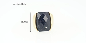 Macro view of blue sandstone ring with 19.9mm stone height and 21.4g gold finish band