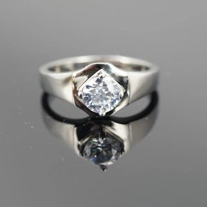 Classic silver titanium steel ring with a brilliant round center stone in a hexagonal setting