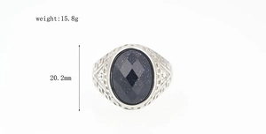 Detailed macro shot of vintage blue sandstone ring with engraved patterns and 15.8g weight