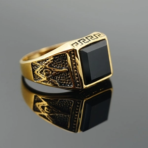 Vintage gold masonic ring for men featuring black onyx gemstone and engraved details