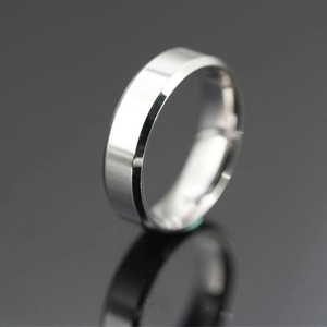 Polished silver stainless steel wide band ring with a reflective mirror finish