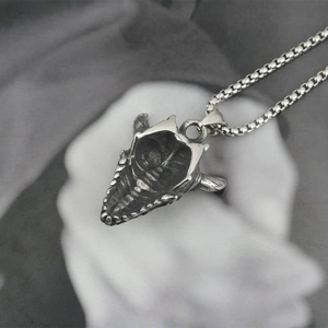 Retro punk style stainless steel necklace featuring a gothic monster skull pendant