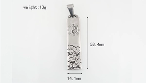 Macro detail of stainless steel pendant with Tai Chi symbol and size measurements