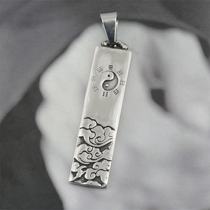 Titanium steel pendant featuring Bagua Yin Yang motif and traditional cloud patterns