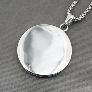 Polished silver titanium steel Viking warrior medallion necklace with a box chain style