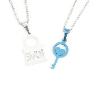 Fashionable stainless steel couple necklace set featuring silver lock and blue key pendants
