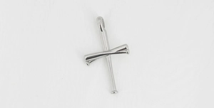Detailed macro view of silver baseball bat cross pendant with a polished metallic finish