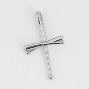 Polished silver stainless steel cross pendant made of two baseball bats on white fabric