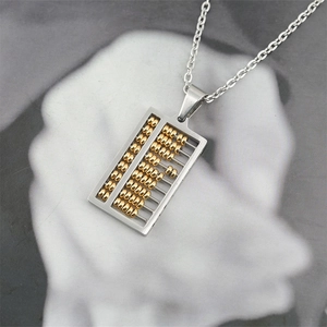 Collier avec pendentif boulier bicolore à la mode en acier avec perles dorées